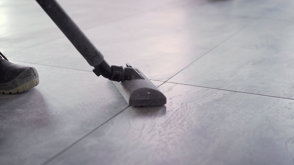 Person,Vacuuming,Dusty,Tiled,Floor.,Housekeeping,And,Domestic,Cleaning,Service